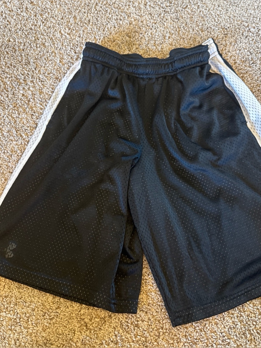 Under Armour Youth XL Black Athletic Mesh Shorts with White Side Panels